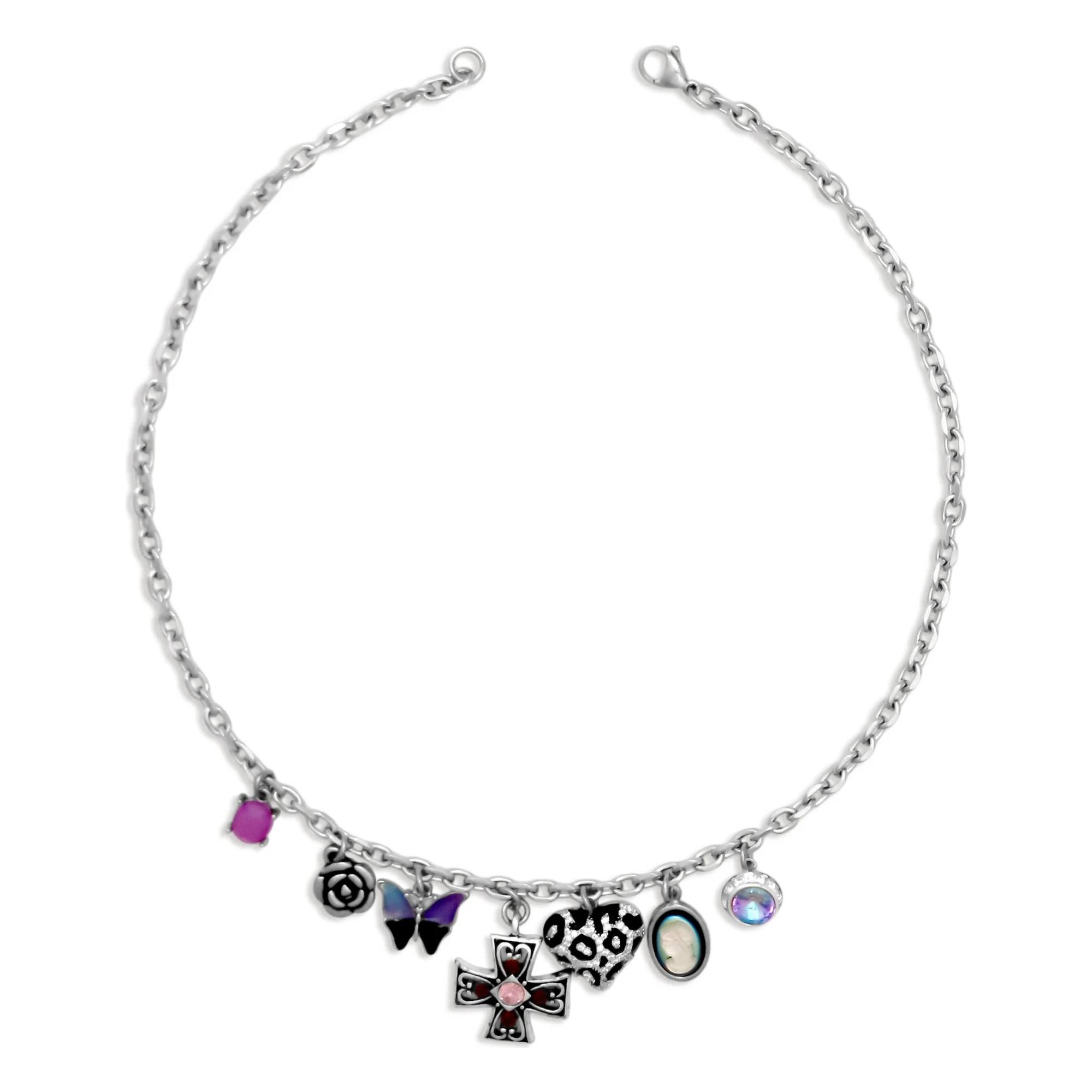 A woman wearing a stainless steel Mystic Noir charm necklace with butterfly and vintage-style charms, by Enleira