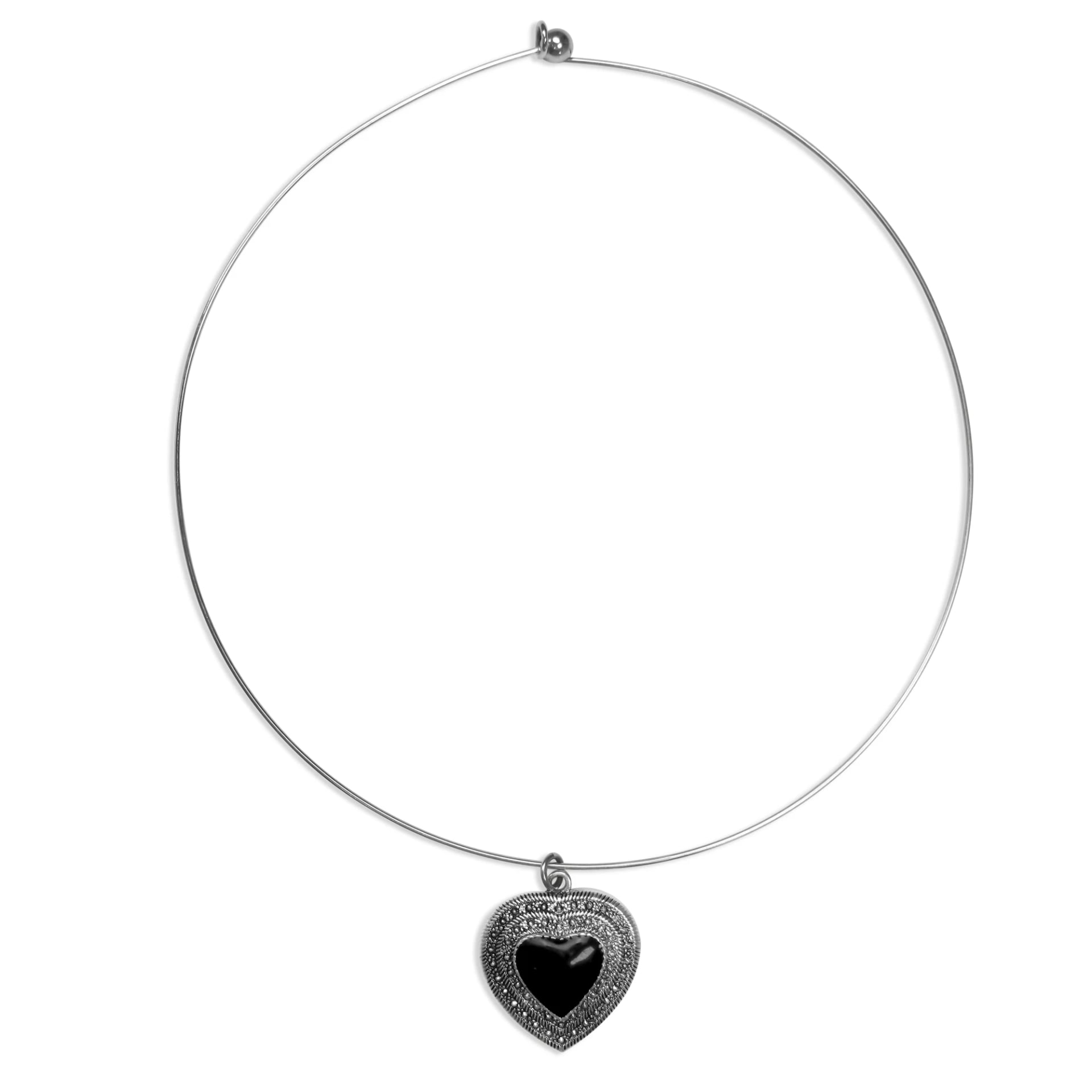 A vintage-style stainless steel heart charm with a dark center stone on a collar necklace, by Enleira
