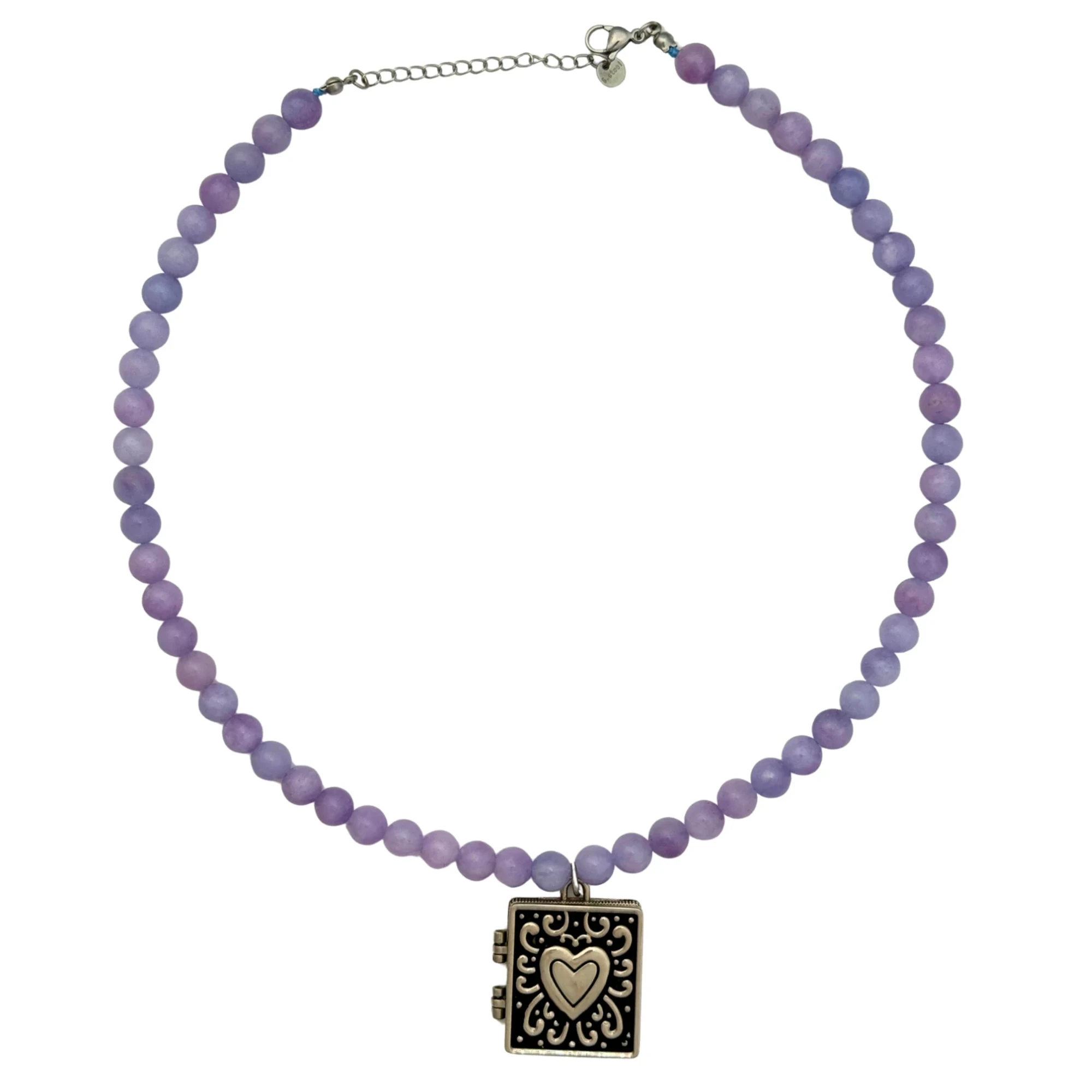 Ornate stainless steel heart locket on a purple beaded necklace, by Enleira
